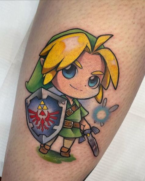 Anime Gaming Cartoon Tattoos on Instagram: "Link and Navi for Georgia! Thank you so much! • #tattoo #tattooart #instatattoo #link #zelda #zeldatattoo #linktattoo #nintendotattoo #otakutattoo #chibiart #chibitattoo" Nintendo Tattoo, Dahlia Tattoo, Zelda Tattoo, Omerta Tattoo, Skeleton Hand Tattoo, Back Of Shoulder Tattoo, Gaming Tattoo, New School Tattoo, Traditional Tattoo Flash