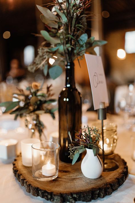 Nature Centerpieces Wedding, Wedding Table Decorations Wine Bottles, Flowers In Wine Bottles Wedding, Wedding Decor With Wine Bottles, Circle Table Centerpiece Wedding Simple, Wine Bottle Decorations Wedding, Flowers In Bottles Wedding, Wedding Centerpieces With Wine Bottles, Wine Bottle Centrepiece