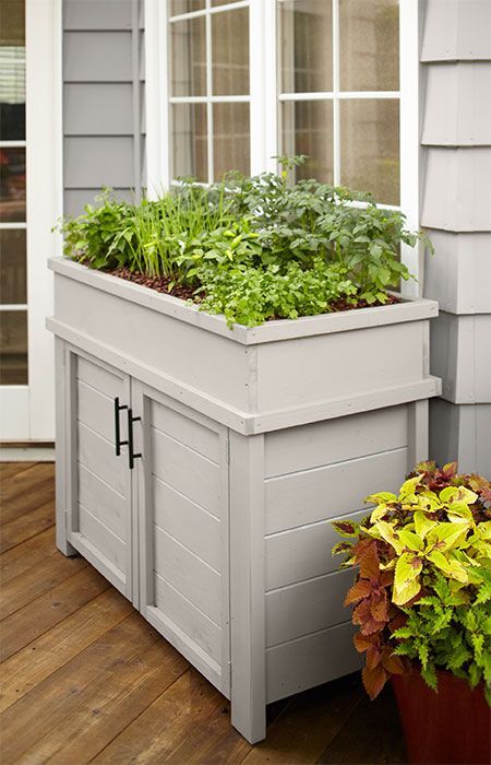 Raised Planter with Storage Patio Garden Ideas On A Budget, Front Porch Garden, Budget Garden, Patio Storage, Apartment Patio, Raised Planter, Porch Garden, House With Porch, Patio Decorating