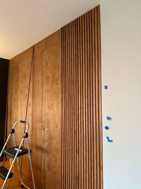 DIY slat wall with hidden doors - functional slat wall with hidden closet Diy Closet Wall, Hidden Entry Closet, Slat Wall Secret Door, Wood Slat Wall Hallway, Hidden Linen Closet, Hide Closet Doors, Slat Wall Closet, Slatwall Hidden Door, Wall Paneling Hidden Storage