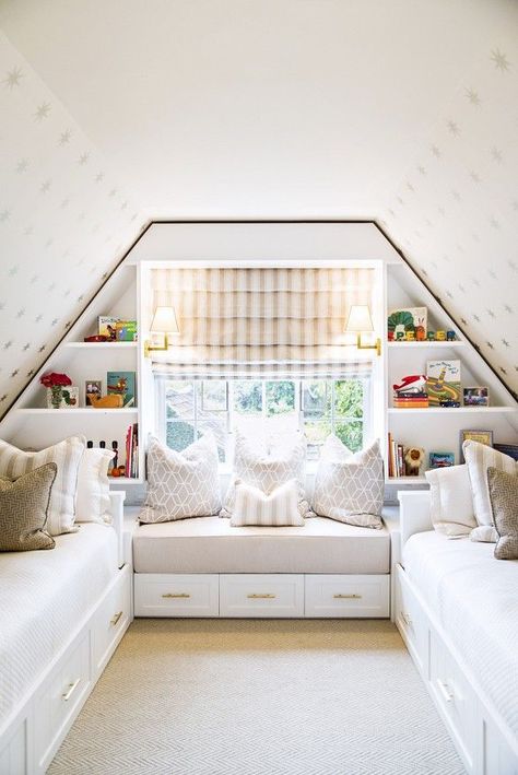 Bright attic bedroom with built-in shelves, and neutral color palettes. Attic Bedroom Small, Studio Lifestyle, Small Kids Room, Slanted Ceiling, Neutral Bedrooms, Storage Kids Room, Attic Bedrooms, Bedroom Seating, Attic Spaces