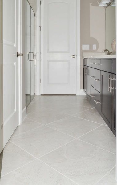 Different Size Tile Floor Pattern, Simple Tiles Floor, Large Format Tile Floor Small Bathroom, Bathroom Floor White Tile, Large Square Bathroom Tiles, Large Floor Tile Small Bathroom, Bathroom Floor Tile Square, Light Tile Entryway, Square Tile Kitchen Floor