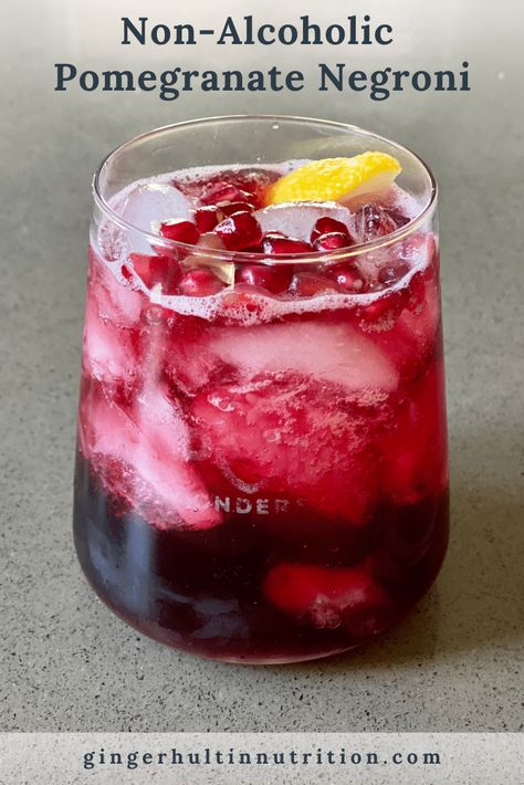 This non-alcoholic pomegranate negroni is beautiful and delicious. A great way to celebrate no alcohol needed! #mocktail #partydrink #festive Mocktail Easy, Pomegranate Mocktail, Mocktails Non Alcoholic, Pomegranate Drinks, Mixology Recipes, Holiday Mocktail, Fun Party Drinks, Pomegranate Recipes, Iced Drinks Recipes