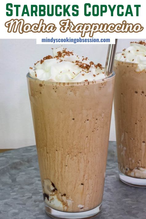 Making a Starbucks Frappuccino at home has never been easier with our easy and delicious recipe. Instant coffee granules, milk, chocolate sauce and ice are blended together and then topped with whipped cream and shaved chocolate. It's the perfect frozen coffee drink, especially on hot days! via @mindyscookingobsession Blended Mocha Coffee Recipe, Vitamix Coffee Drinks, Instant Coffee Frappuccino, Blender Coffee Recipes, Frozen Whipped Coffee Recipe, Espresso Powder Recipes Coffee, Ninja Creami Coffee Drinks, Frozen Whipped Coffee, Frozen Mocha Coffee Recipe