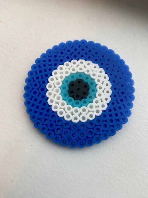 Perler Bead Patterns Evil Eye, Pearl Beads Idea, Evil Eye Perler Bead Pattern, Picture Beads Ideas, Perler Beads Evil Eye, Things To Make With Melting Beads, Pearler Bead Ideas Preppy, Perler Bead Ideas Halloween, Perler Designs Ideas