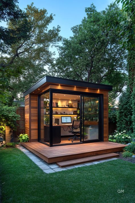 Modern tiny house with a sleek, wooden exterior and floor-to-ceiling windows, serving as a cozy home office. Perfect for tiny house inspiration. Garden Studio Ideas, Backyard Office Studio, Backyard Office Shed, Garden Shed Interiors, Office Shed, Zoo Architecture, Tiny House Loft, Backyard Studio, House Loft