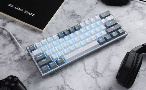 This is the redragon K617. It's a 60% mechanical keyboard with 61 compact keys, dedicated for fps gamersand efficient working. I am using it for over a year now and it's an absolute beast. It's not that expensive and it works really well. So if you are on a budget or you need a new keyboard, be sure to check this one out. 60% Keyboard, Musical Keyboards, Basic Mechanics, Keyboard Protectors, Gaming Keyboard, Game Room Design, Computer Peripherals, Mechanical Keyboard, Home Tv