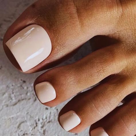 13 Winter Toenail Colors for Dark Skin Tones Perfect for Cold Days - Call Toenail Colors, Pedicure Fair Skin, Neutral Color Pedicure, White Nail Color Ideas, Fall Toenail Colors 2024, Fall Toe Colors, Bridesmaid Toenails, Winter Toenail Colors, Nail And Feet Set Ideas