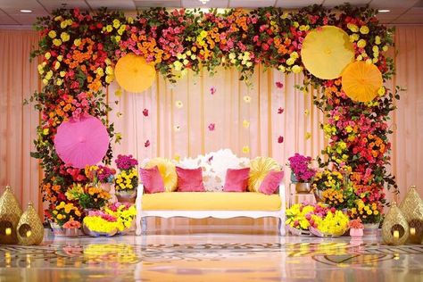 CHEZ ROSE FLORAL DESIGNS on Instagram: "Colorful Summer vibes 💕 . . #mehndi #mehndinight #colorful #mehndidesign #mehndidecor #mehndistage #chezrosefloraldesigns #teamchezrose #floraldesign #stagedesign #event #decor #design #beautiful #mehndilove #summervibes #eventdecor #mehndilook #eventdesign" Mehandi Event Decoration, Mayra Decoration Ideas, Colorful Sangeet Decor, Mehendi Event Decor, Mehndi Backdrop Stage Decorations, Mehandi Decoration Indian Weddings, Mayra Function Decoration, Mehendi Event Decoration, Mehndi Setup Decor