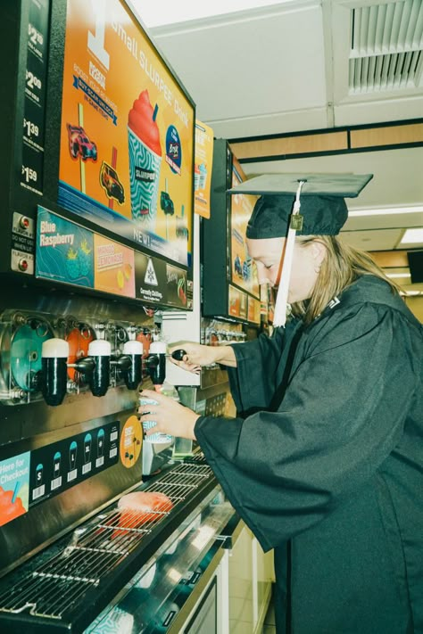 7/11 graduation photoshoot Funny Grad Pics Photo Ideas, Academic Senior Pictures, Grad Playlist Cover, College Graduation Pictures With Books, 2000s Graduation Pics, Funny Senior Photo Ideas, Vintage School Photoshoot, 70s Graduation Pictures, Unusual Senior Picture Ideas