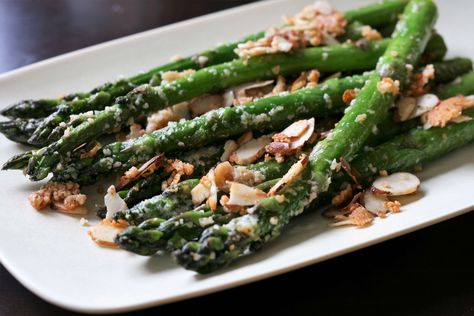 Asparagus spears are sauteed in butter with sliced almonds and parmesan cheese. This is a terrific side with grilled salmon or turkey meatballs. Asparagus On The Stove, Pan Fried Asparagus, Fried Asparagus, Asparagus Recipes Oven, Italian Side Dishes, Easy Asparagus Recipes, Best Asparagus Recipe, Recipes With Parmesan Cheese, Asparagus Dishes