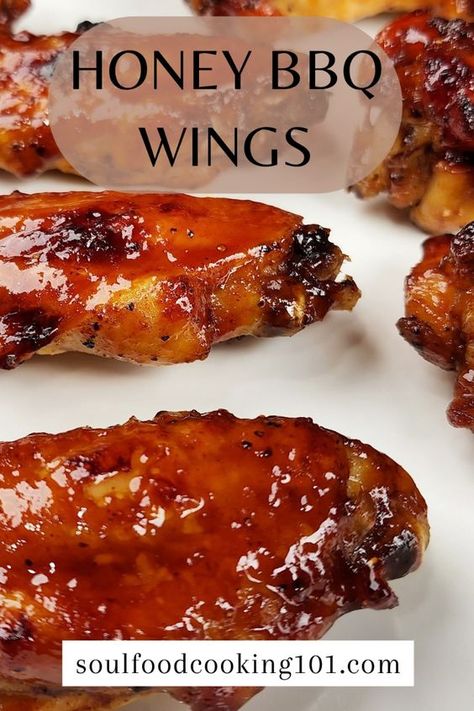 This easy recipe for oven baked Honey BBQ Wings yield crispy, sticky and tasty wings. I hope you give this recipe a try. For the printable recipe visit:  https://soulfoodcooking101.com/best-baked-honey-bbq-wings/ Honey Baked Chicken Wings, Honey Bbq Chicken Wings In The Oven, Honey Wings Recipe Oven Baked, Honey Bbq Wing Sauce, Easy Bbq Wings In Oven, Honey Bbq Wings Baked, Best Chicken Wings Recipe Baked, Oven Wings Recipe, Bbq Wings In Oven