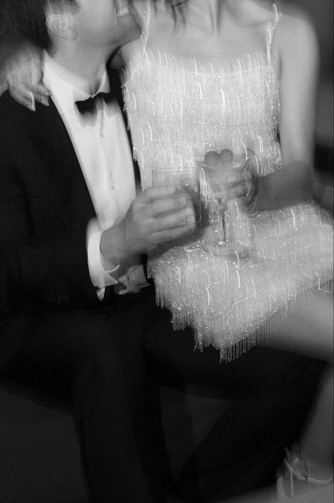 Wedding after party, sparkly mini dress, tuxedo, black and white wedding photgraphy, champagne, blurry wedding photo Wedding Tuxedo Aesthetic, Black And White Flash Wedding Photos, Private Last Dance Wedding Photo, Wedding After Party Club, Wedding Blurry Photos, New Year’s Eve Engagement Photos, Late Night Wedding Photos, Wedding Reception Party Photos, Wedding After Party Photos