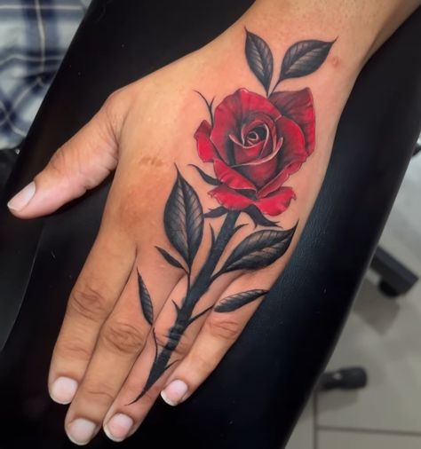 Rose With Leaves Tattoo, Black Rose Hand Tattoo, Red Rose Hand Tattoo, Hand Tattoos Rose, Red Rose Tattoo Design, Tattoo Ideas Female Hand, Engagement Tattoos, Red Tattoo Ideas, Red Ink Tattoo