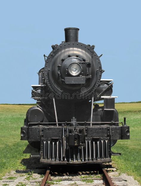 Photo about Front view of a vintage black railroad train steam locomotive, on tracks in a field with a clear blue sky in the background. Image of engine, retro, locomotive - 27206938 Train Front View, Train Tattoo, Clear Blue Sky, Vintage Train, Steam Locomotive, Steam Trains, Front View, Train Station, Modern Vintage