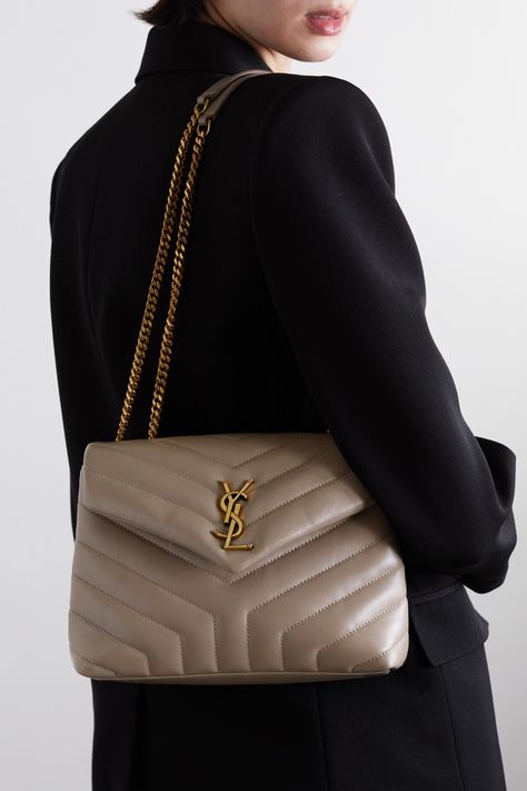 Originally created by graphic designer Adolphe Jean-Marie Mouron in 1962, SAINT LAURENT's iconic 'YSL' monogram continues to be recognized as an assurance of quality and luxury. This quilted 'Loulou' bag has been made in Italy from smooth leather detailed with signature chevron stitching. Though compact, it has a well-organized interior with two compartments, a zipped pocket and three card slots. Ysl Loulou Bag, Ysl Logo, Bag Dark, Purse Brands, Dior Handbags, Small Quilts, Saint Laurent Bag, Womens Purses, Stylish Bag