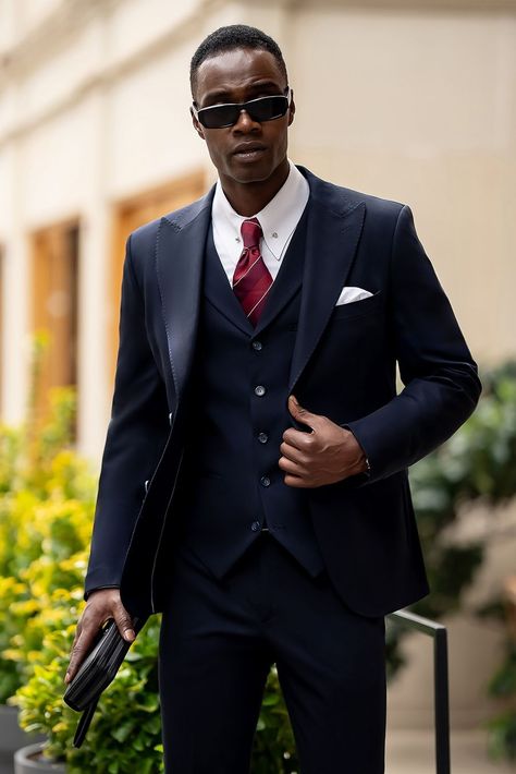 Timeless and refined, the navy slim-fit suit 3-piece is the epitome of classic elegance. Crafted with precision, it offers a sleek, tailored look for every occasion. Command the room with effortless sophistication.

#navyslimfitsuit #threepiecesuit #sleekstyle #modernmenswear #refinedfashion #tailoredperfection #elevatedstyle #timelesslook #boldstatement #gentlemansattire Navy Slim Fit Suit, Bow Tie Suit, Modern Fit Suit, Suit Styles, Suit Stores, Slim Fit Suit Men, Lapel Jacket, Navy Suit, Slim Fit Suits