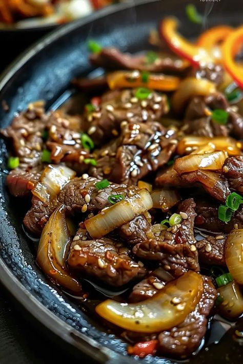 Chinese Pepper Steak with Onions is a delicious and easy stir-fry recipe packed with tender steak, crunchy bell peppers, and a savory sauce. Perfect for a quick weeknight dinner, this 30-minute meal will become a favorite in your home. Serve it with rice or noodles for a complete and satisfying dish. Save this recipe for your next family meal and give it a try tonight! Chinese Pepper Steak With Onions Recipe, Pepper Steak With Onions, Pepper Steak And Onions, Steak With Onions, Steak Stirfry Recipes, Chinese Pepper Steak, Fried Steak Recipes, Steak And Rice, Pepper Steak Recipe