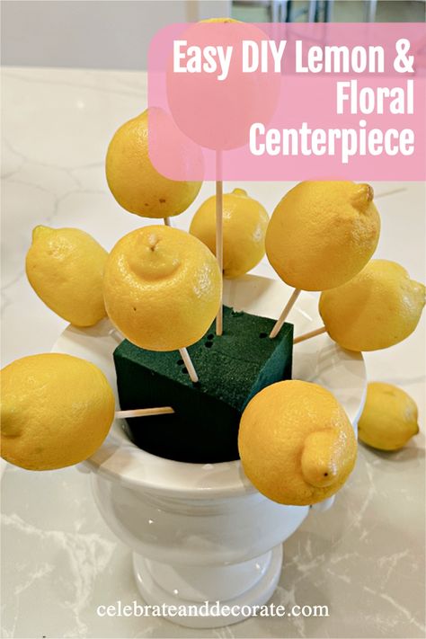 lemon centerpiece in process of being made with text overlay easy diy lemon and floral centerpiece Lemon And Orange Centerpieces, Lemon And Hydrangea Centerpiece, Lemon Table Setting Ideas, Italian Dinner Centerpiece Ideas, Lemon Flower Arrangements, Lemon Centerpiece Ideas, Lemon Themed Bridal Shower Ideas, Fruit Centerpieces Wedding, Amalfi Theme