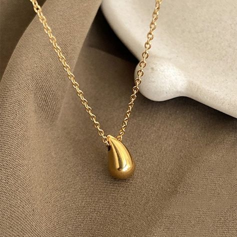 ig style water droplets titanium steel plating 18k gold plated pendant necklace https://trendy-jewels.eu/products/ig-style-water-droplets-titanium-steel-plating-18k-gold-plated-pendant-necklace Trendy Jewels #Hot Necklace Trendy, Drop Pendant Necklace, Water Droplets, Pearl Strands, Steel Plate, Drop Necklace, Drop Pendant, Womens Jewelry Necklace, Pearl Necklace