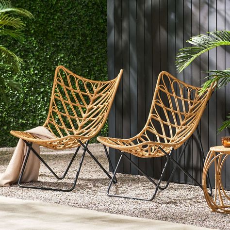 Our 2-piece Patio Accent Chairs set features a wicker finish that provides an earthy boho look for any patio or backyard space. Featuring graceful curves contrasted by clean lines, this set maintains a comfortable and reliable design. Each chair is finished with a geometric cross base, making this modern aesthetic ideal for any style of decor. This isn't merely a chair - it's an open invitation to unwind, reminisce, and create lasting memories under the open sky. Patio Furniture Sets Wicker, All Modern Patio Furniture, Bamboo Patio Furniture, Hanging Patio Chair, Tulum Patio Decor, Small Outdoor Patio Furniture, Boho Porch Decor Outdoor, Boho Wicker Chair, Outdoor Boho Decor