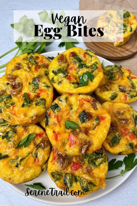 A plate with vegan egg muffins and herbs. Vegan Egg Cups, Vegan Tofu Egg Bites, Vegan Egg Muffins, Vegan Egg Bites Muffin Tins, Tofu Egg Bites, Vegan Egg Bites, Frittata Bites, Sausage Breakfast Muffins, Veggie Bites