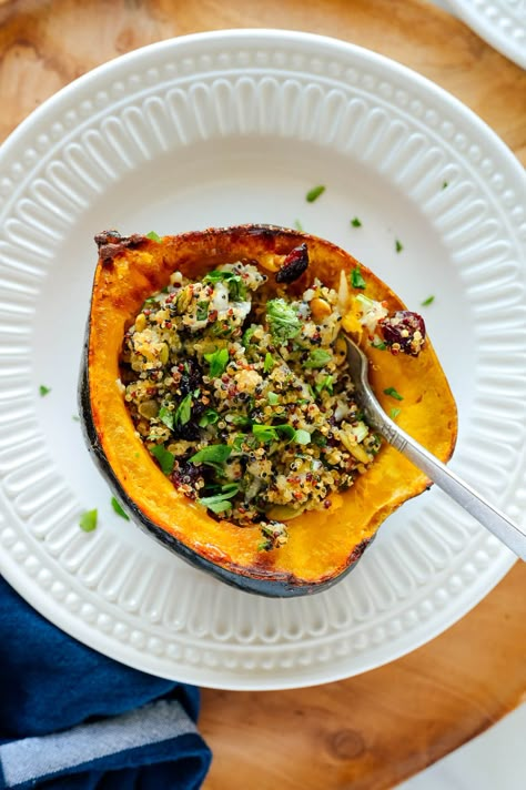 This vegetarian stuffed acorn squash recipe is beautiful and delicious! The cheesy quinoa filling develops an irresistible crispy top in the oven. Make it for the holidays! #acornsquash #wintersquash #quinoarecipe #cookieandkate Stuffed Acorn Squash Vegetarian, Cheesy Quinoa, Vegetarian Thanksgiving Recipes, Stuffed Acorn Squash, Acorn Squash Recipes, Baked Squash, Cookies Gluten Free, Vegetarian Thanksgiving, Meatless Main Dishes