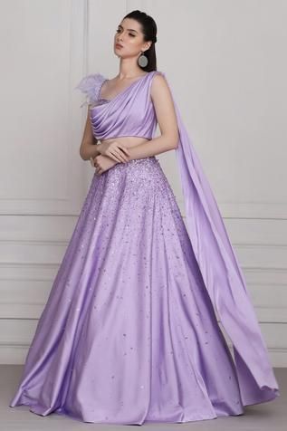 Drape Blouse Indian, One Side Sleeves Blouse Designs, Drape Gowns Designer Latest, One Side Sleeve Blouse, Feather Blouse Designs, Lavender Gown Indian, Drape Gowns Designer, Lavender Blouse Design, Pooja Peshoria