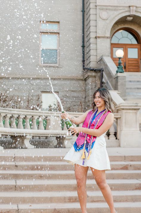 Graduation Poses Champagne, Graduation Pictures With Stole, Graduation Pictures Champagne Pop, College Grad Pictures Photo Ideas, Culinary Graduation Pictures, Popping Champagne Pictures Graduation, College Graduation Pose Ideas, Cap And Gown College Pictures, Nursing School Graduation Pictures With Family