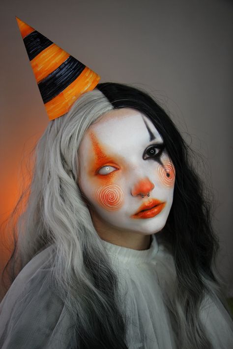 By @uncreative.af #halloween #halloweenmakeup #bodypaint #clownmakeup #halloweenclown #clown Halloween Makeup Clown Cute, Orange And Black Clown Makeup, Clown Makeup Photoshoot, Cool Makeup Halloween, Cool Sfx Makeup Ideas, Scary Girl Clown Makeup, Clown Makeup Horror, Clown Glam Makeup, Uv Clown Makeup