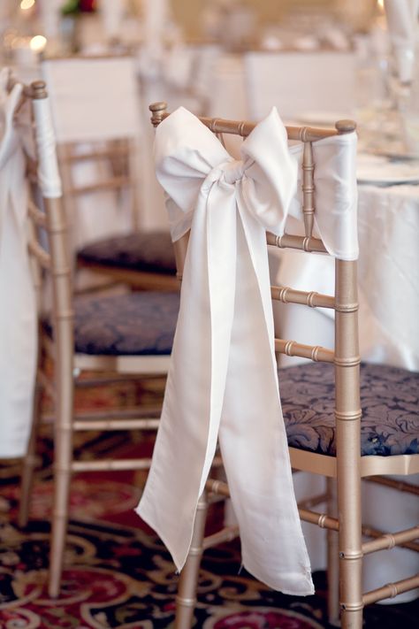 bows on our chairs. Photo by Victoria Souza #thewaterview Tulle On Chairs Wedding, Bows At Weddings, Bows On Chairs Wedding, Wedding Bow Decor, Wedding Bows Decorations, Bow Wedding Decor, Bows On Chairs, Sweetheart Table Chairs, Champagne Chairs