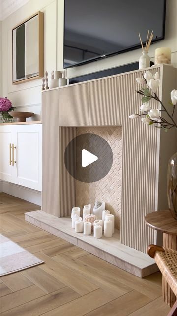 Kerry Kellett on Instagram: "I finally got round to creating that dream fluted fireplace  I had planned over a year ago 🤍✨  Panels from @panelsbysofia  Tiles from @bandq_uk  Paint is a mix of white 03 and beige 02 @lick   #fireplace #fireplaces #fireplace🔥 #fireplacedecor #fireplacemakeover #fireplacedesign #fireplacemantel #flutedfireplace #homediy #homediyproject #diyprojects #homeinterior #modernhomedesign" Flute Fireplace, Diy Fluted Fireplace Surround, Diy Fluted Fireplace, Fluted Stone Fireplace, Fireplace Mantle Design, New Fireplace Ideas, Closed Fireplace Ideas, Fluted Wood Fireplace, Ribbed Fireplace