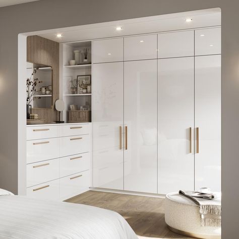 Hockley mirror gloss white bedroom from Howdens. Simple and sleek style. Modern slab design. High-quality finish. Professional and local design expertise. White Fitted Wardrobes, White Wardrobe Designs, White Wardrobe Bedroom, Fitted Wardrobe Ideas, Howdens Hockley, Glass Wardrobe Design, Closet Design Plans, Dressing Table Ideas, Fitted Wardrobe