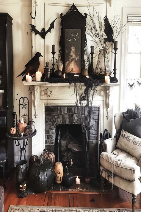 Create an enchanted Halloween scene with magical fireplace decor. Pumpkins, bats, and mystical elements bring a fairy-tale feel to your living room. Check out more Halloween fireplace decor living room ideas and follow us for more inspiration! Living Room Fireplace Decor, Halloween Living Room Decor, Enchanted Halloween, Halloween Mantel Decor, Halloween Fireplace, Halloween Living Room, Halloween Mantle Decor, Cheap Halloween Decorations, Spooky Home Decor