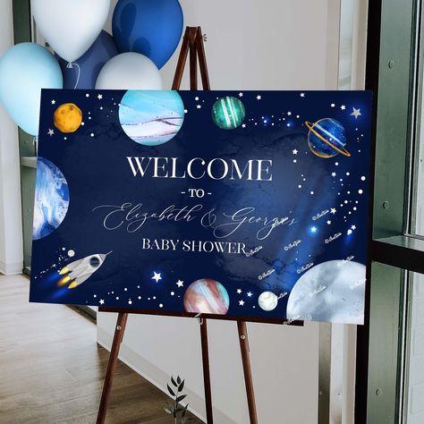 "Celebrate the arrival of your little astronaut with our beautifully designed Outer Space baby shower welcome sign template. ⭐PLEASE READ BEFORE ORDERING⭐ - The item you're ordering is a printable digital item - The price doesn't include any physical items shipped to you - Printing service is not included in this order - After purchasing the listing, you will receive an email from 'corjl.com' with a link to access and edit your file on their website. We do NOT send these files/templates directly to your email. All text editing and download of the files from Corjl website is customer's responsibility. You can also access and edit your purchased item on Corjl website by entering your email address and the number of your purchase order. - The free demo version available on the Corjl website g Outer Space Baby Shower Ideas Boy, Houston We Have A Boy Baby Shower Decor, Outer Space Baby Shower Ideas, Galaxy Baby Shower Ideas, Space Theme Baby Shower Ideas, Space Baby Shower Theme, Unique Boy Baby Shower Themes, Astronaut Baby Shower Ideas, Space Themed Baby Shower Ideas