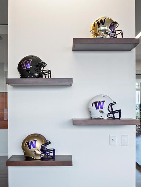 Helmet display Football Helmet Shelf Display, Helmet Display Ideas Man Cave, Shelves For Sports Memorabilia, Man Cave Display Ideas, Football Helmet Display Ideas Man Caves, Man Cave Display Shelves, How To Display Football Helmets, Sports Shelf Display Shelves, Football Helmet Wall Display