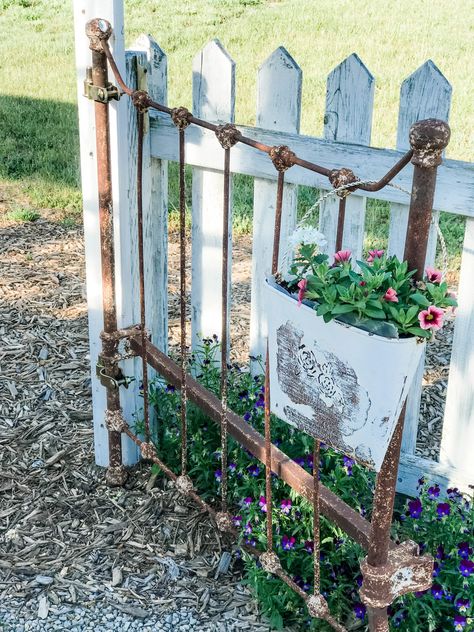 My garden is very casual and cottage style. I have fun creating separate "rooms" to meander through. And entering a garden through a gate is so romantic. Gerald built the picket fence in the garden, complete with a picket gate for one of the entrances. I had two old iron twin headboards that have been … Garden Gates And Fencing, Old Headboard, Garden Gate Design, Greenhouse Gardening, Garden Yard Ideas, Garden Gate, Picket Fence, Rustic Gardens, Vintage Garden