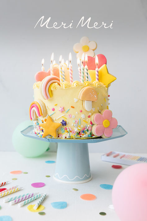 Colorful birthday cake decorated with flower, mushroom, heart and star sugar cookies and sprinkles. Cute Sugar Cookies, Rainbow Birthday Cake, Balloon Cake, Baby Birthday Cakes, Meri Meri, Rainbow Sprinkles, Colorful Cakes, Diy Cake, Rainbow Cake