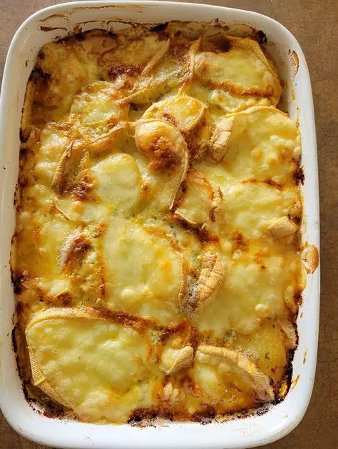 Tartiflette (French Potato, Bacon, and Cheese Casserole) | Allrecipes French Potato Casserole, Tossed Green Salad, Tartiflette Recipe, French Potatoes, Potato Bacon, Bacon And Cheese, Potato Onion, Cheese Casserole, Creamy Cheese