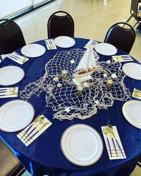 Sailing Into 60 | CatchMyParty.com Nautical Centerpieces, Sailing Birthday, Lighthouse Theme, Fishing Themed Wedding, Nautical Centerpiece, Sailing Theme, Boat Interior Design, Nautical Party Decorations, Cruise Party