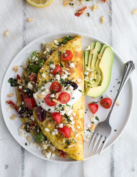 Mad Greek Quinoa Dinner Omelets with Feta and Tzatziki | halfbakedharvest.com Greek Quinoa, Telur Dadar, Menu Sarapan Sehat, Omelets Recipe, Low Carb Vegetarian, Half Baked Harvest, Carne Asada, Quinoa Recipes, Spring Recipes