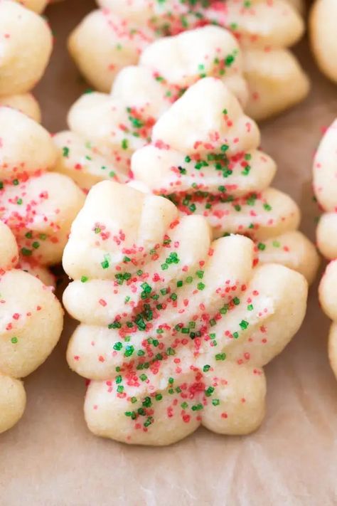 Holiday Spritz Cookies Recipe - These easy Christmas spritz cookies are a wonderfully tasty classic! #Holiday #Christmas #Cookies #Spritz Cream Cheese Spritz Cookie Recipe, Elf Snacks, Cream Cheese Spritz, Christmas Spritz, Cream Cheese Spritz Cookies, Spritz Cookie Press, Gooey Desserts, Christmas Spritz Cookies, Holiday Deserts