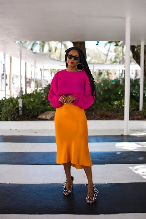 Bright Colors Winter Outfit, Hot Pink Orange Outfit, Bright Outfits Black Women, Orange Satin Skirt Outfit, Purple And Orange Outfit, Orange And Purple Outfit, Pink And Orange Outfit Ideas, Orange And Pink Outfit, Pink And Orange Outfit