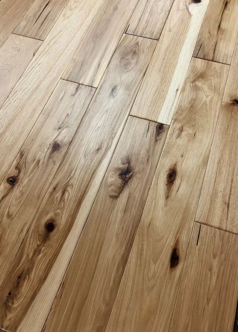 Sawmill Hickory Natural 3/4 x 4-3/4" Wire Brushed Solid Hardwood Floor This distressed Hickory is very durable and works great in active environments.