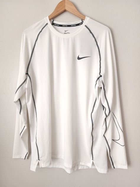 Nike Pro Dri-FIT Size XL Men's Slim Fit Long-Sleeve Top DD1980-100 NWT. Men’s Clothing Aesthetic, Men’s Long Sleeve Shirt, Long Sleeve Men, White Fits, Men Tops, Nike Drifit Shirts, Long Sleeve Shirts Men, Mens Fits, Nike Cotton Sports Shirt