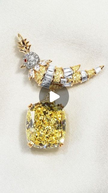 Tiffany & Co. on Instagram: "An evolution of Jean Schlumberger’s original Bird on a Rock design, this diamond-encrusted brooch features a cushion-cut Fancy Intense Yellow diamond of over 42 carats. Epitomizing the unrivaled craftsmanship for which Tiffany is known, the brooch also features a magnificent combination of 188 baguette, pear-shaped and round brilliant white and yellow diamonds.

#TiffanyAndCo #JeanSchlumberger" Luxury Gia Certified Yellow Sapphire Jewelry, Luxury Yellow Gold Pendant Charms, Yellow Citrine Pendant Necklaces, Luxury Citrine Pendant Necklace, Polished Citrine Pendant Necklace, Tiffany And Co, Rock Design, Cushion Cut, Yellow Diamond