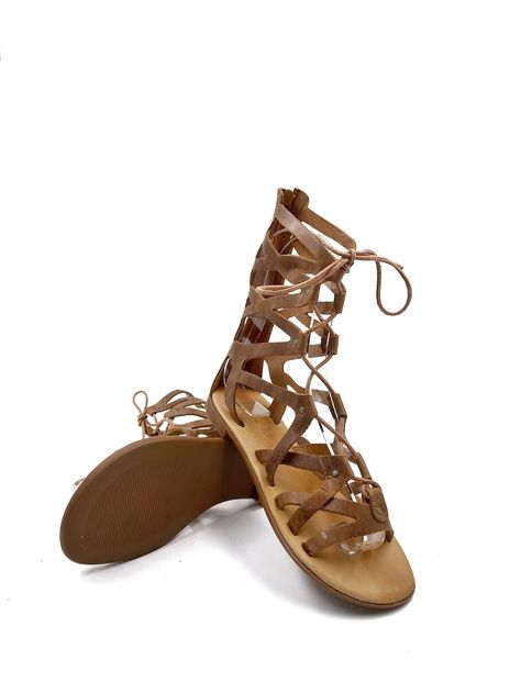 Τop quality handmade brown lace up gladiator sandals made by us. Our sandals are specially designed with soft sole for greater comfort at every step. Material: Leather Sole Material: PU In Sole: Leather & Cushing Heel Height: 1.6 cm Size 35 - Length 23.5 cm (9.2 inches) Size 36 - Length 24 cm (9.4 inches) Size 37 - Length 24.5 cm (9.6 inches) Size 38 - Length 25 cm (9.8 inches) Size 39 - Length 25.5 cm (10 inches) Size 40 - Length 26 cm (10.2 inches) Size 41 - Length 26.5 cm (10.4 inches) Size 4 Lace Up Gladiator Sandals, Genuine Leather Sandals, Leather Gladiator Sandals, Handmade Sandals, Brown Leather Sandals, Sandals For Women, Gladiator Sandals, Women's Shoes Sandals, Leather Sandals