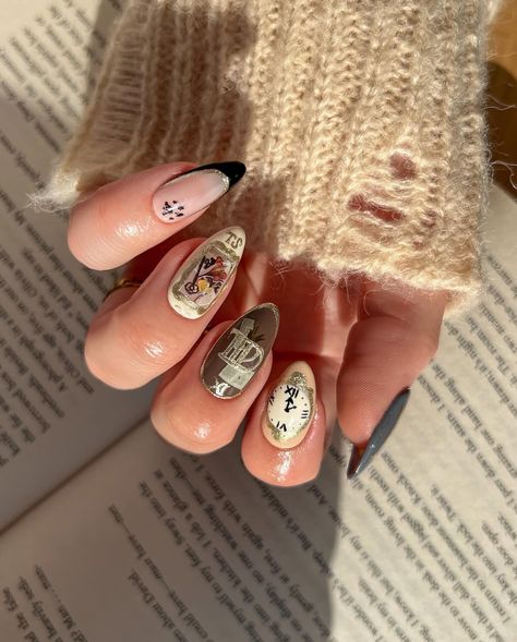 so tortured, so poetic 📝🪶📖 happy #TTPD eve🤍 @lightslacquer dream st, iced latte, or worse expelled, cold case, tuxedo mask, earth angel & bibliotheque nail art tattoos 📰🗃️🤎 In true swiftie fashion, I hid a few easter eggs in this look, can you spot them?? I am SO excited for the tortured poets department, I cannot put it into words!! I had so much fun creating this look for tonight’s release, who else will be listening at midnight🙋🏼‍♀️📑🎧 Taylor Swift Inspired Nails Ttpd, Ttpd Nail, Tortured Poets Department Nails, Eras Tour Nails Ttpd, Ttpd Nails Taylor Swift, Taylor Swift Nail Art, Angel Nail Art, Eras Nails, Uni Nails