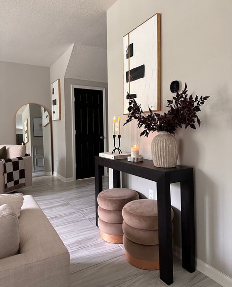 Looking for the finishing touch to bring your space together? Our console tables add beautiful details to complete your vision.⁠ .⁠ Our solid wood console tables have stunning, minimalist designs. They are the perfect staple for any room, hallway, or entryway, giving you a base to show off your style through decor. Click the link in our bio to check out all of our console table designs!⁠ .⁠ #plankandbeam #console #livingroomdecor #hallwaydecor #homedetails #quietluxury #minimalistaesthetic Minimalist Hallway Decor, Minimalist Entryway Decor, Black Entryway Table Decor, Black And White Hallway Ideas, Black Console Table Decor, Minimalist House Decor, Narrow Entryway Ideas, Console Table Ideas, Black Entryway Table