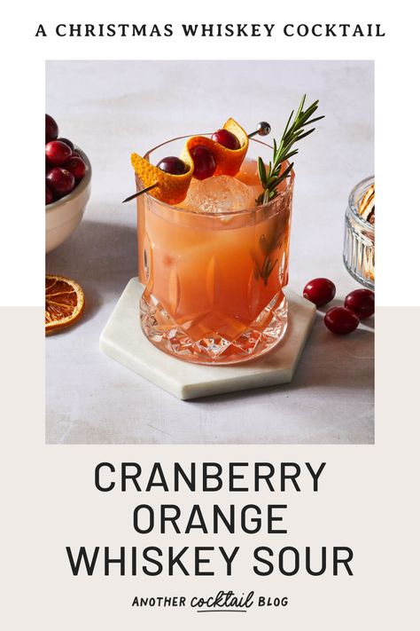 This cranberry orange whiskey sour is a vibrant cocktail that balances the rich, warmness of whiskey with tangy cranberry and bright citrus. This egg-free sour is a smooth and refreshing take on the classic whiskey sour that's perfect for the holiday season. Orange Whiskey Sour, Cranberry Cocktail Recipe, Caramel Apple Martini, Whiskey Sour Recipe, Whisky Sour, Orange Cocktails, Cranberry Cocktail, Sour Cocktail, Orange Christmas